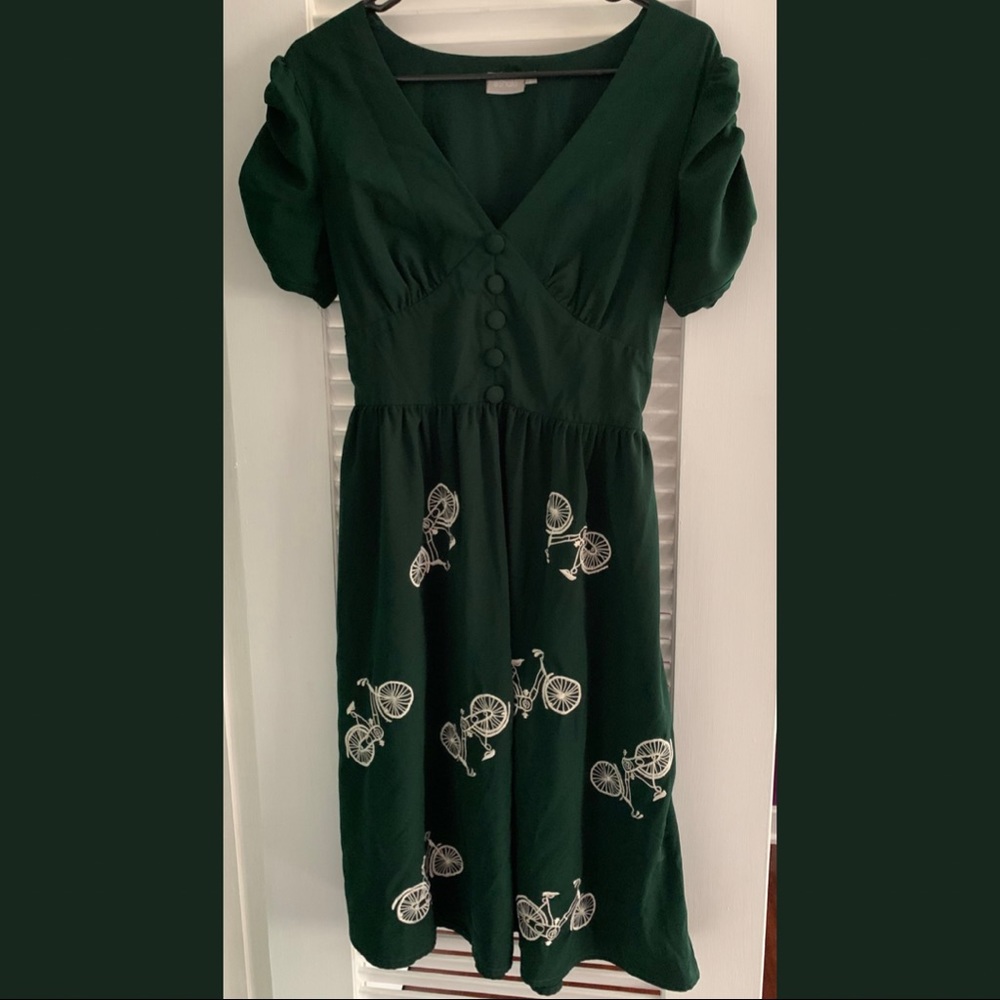 Green Eshakti dress with bicycle embellishments 🚲